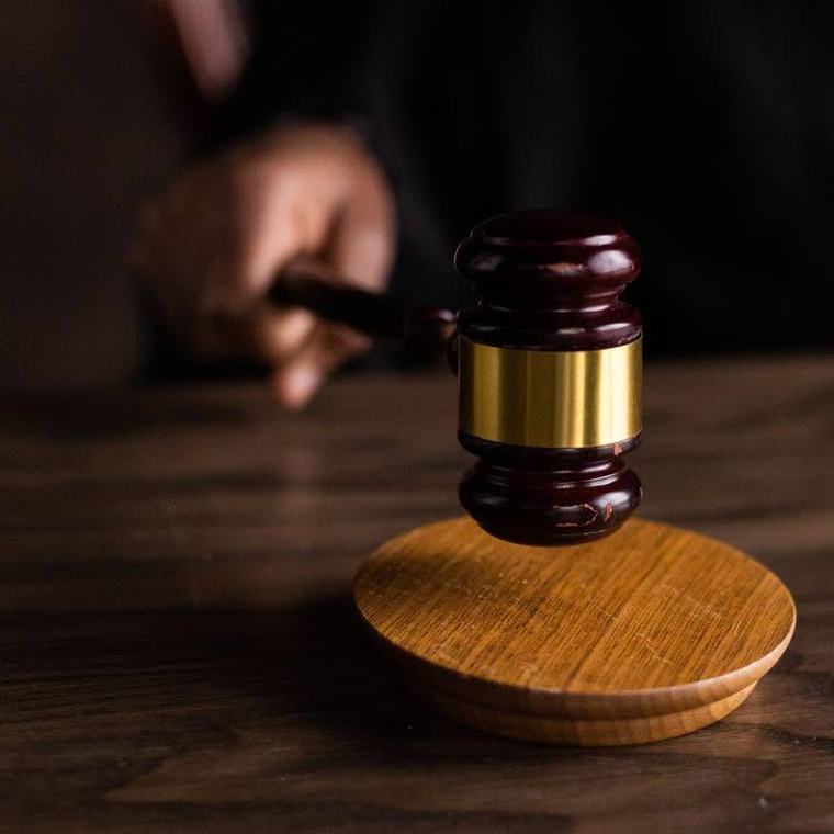 Two fraud charges dropped against Manchester JP
